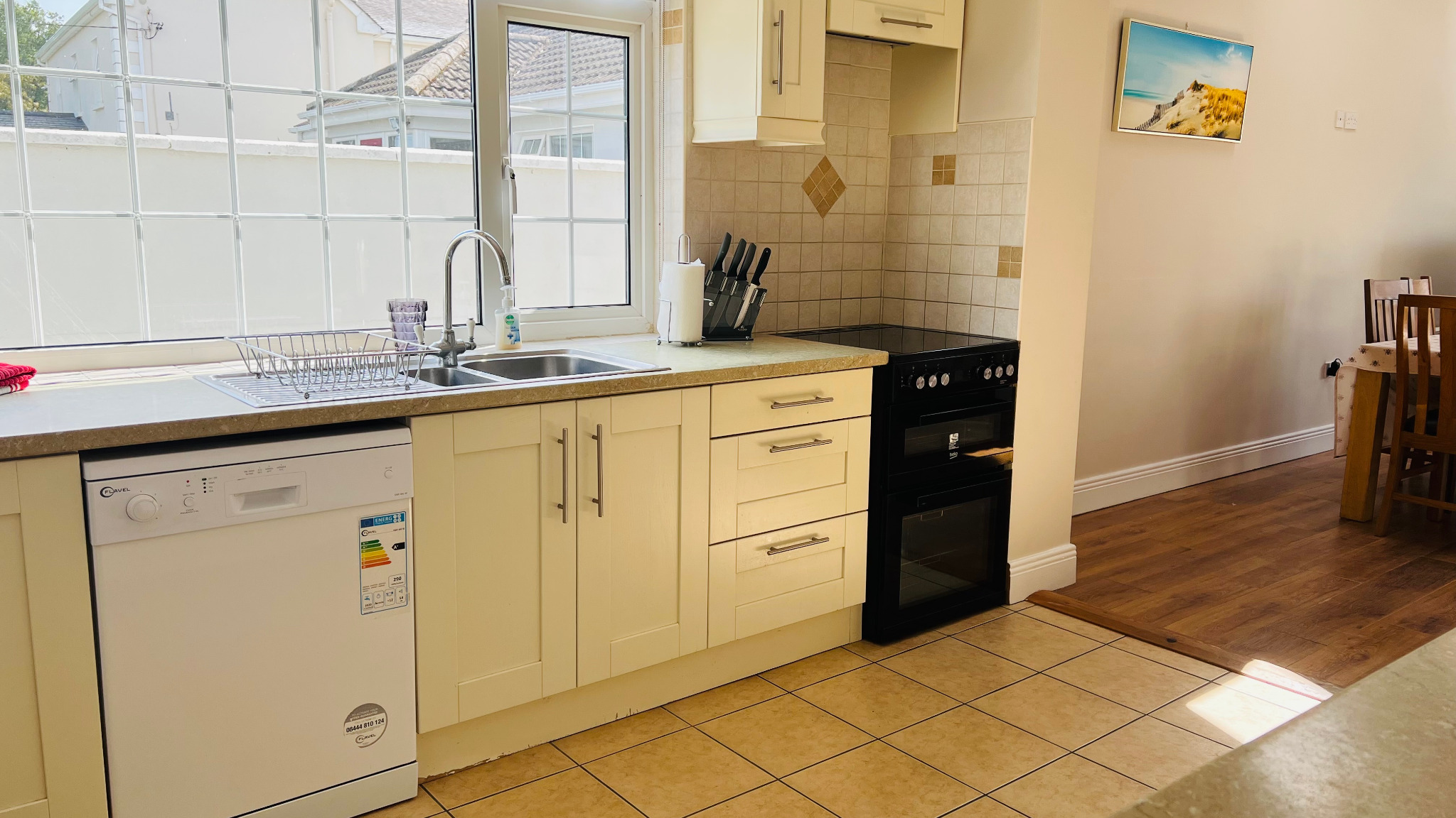 Kitchen and dining doorway at Dash Bungalow